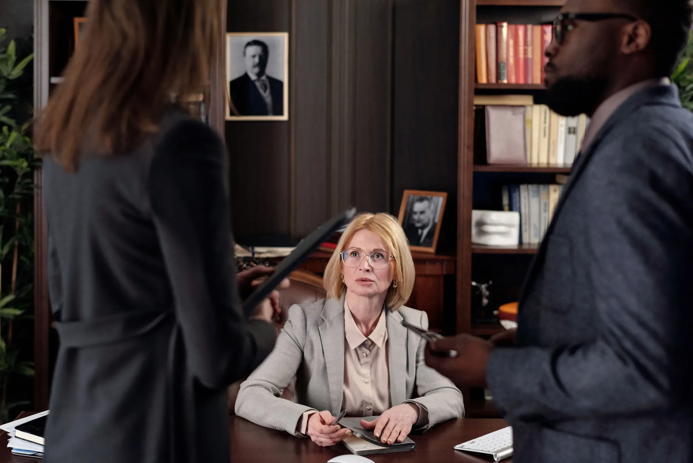 Attorneys meeting around a conference table in a contemporary office
