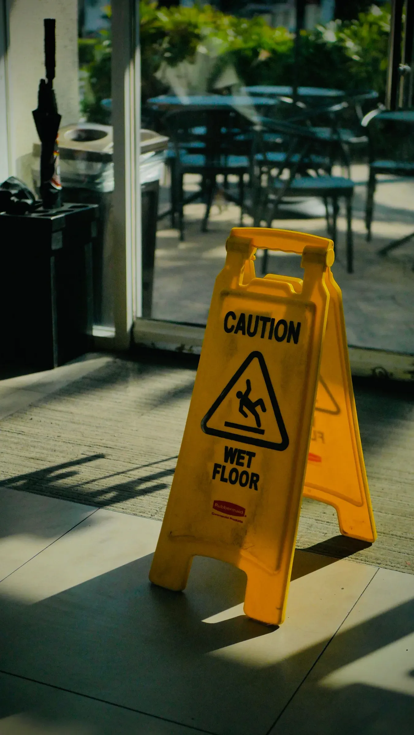 Wet floor warning in a public walkway